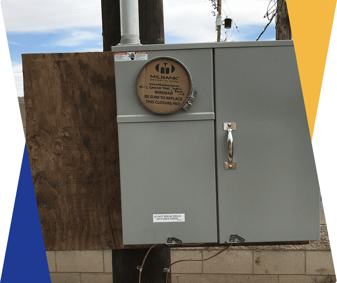 Electrical meter box on utility pole.