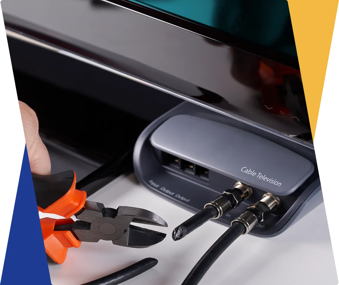 Cable connection with pliers and cut wire.